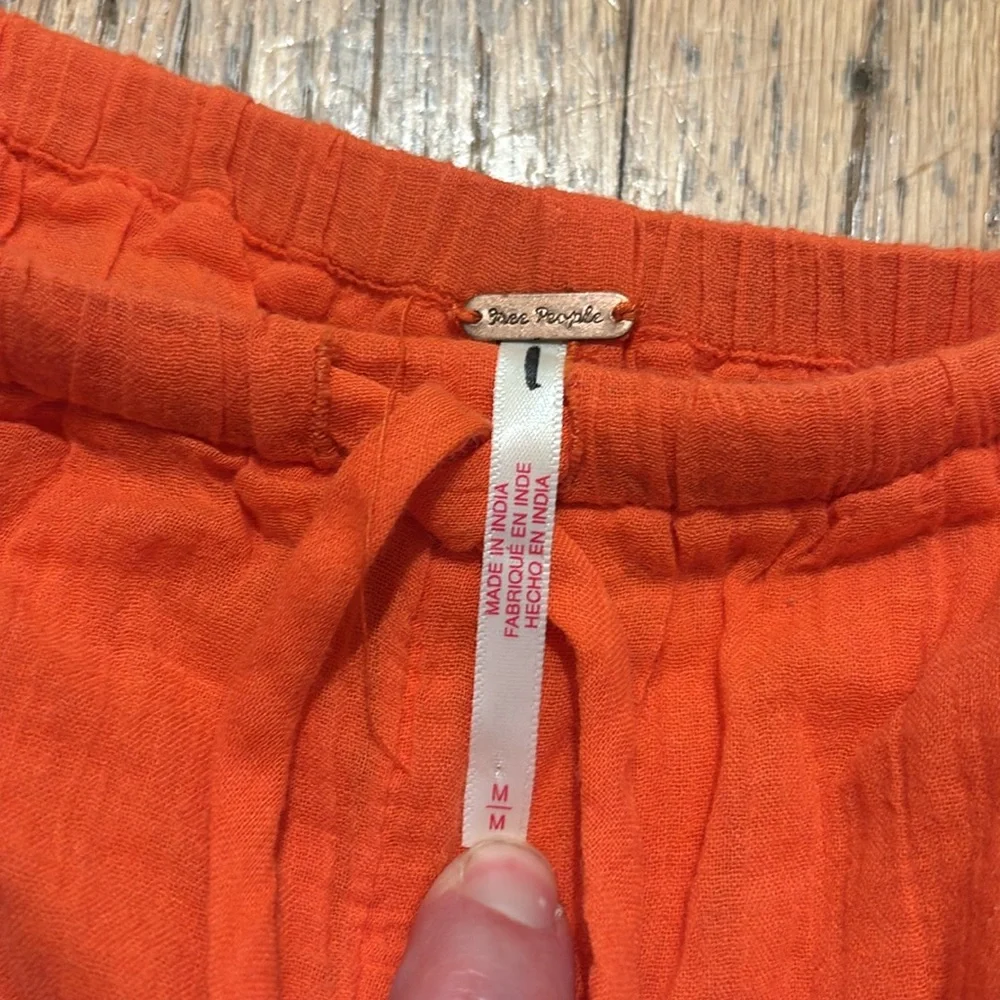 NWOT Free People orange gauze and lace detail Shorts - M